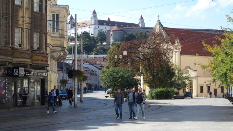 Bratislava Castle view from the old town streets for a travel guide blog.