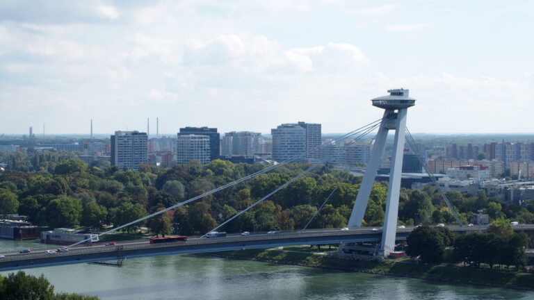 Panoramic view of UFO Bridge and Danube river during Bratislava city tour.